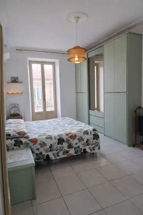 спальня в бюджетной квартире в Borgo Rossini Турин