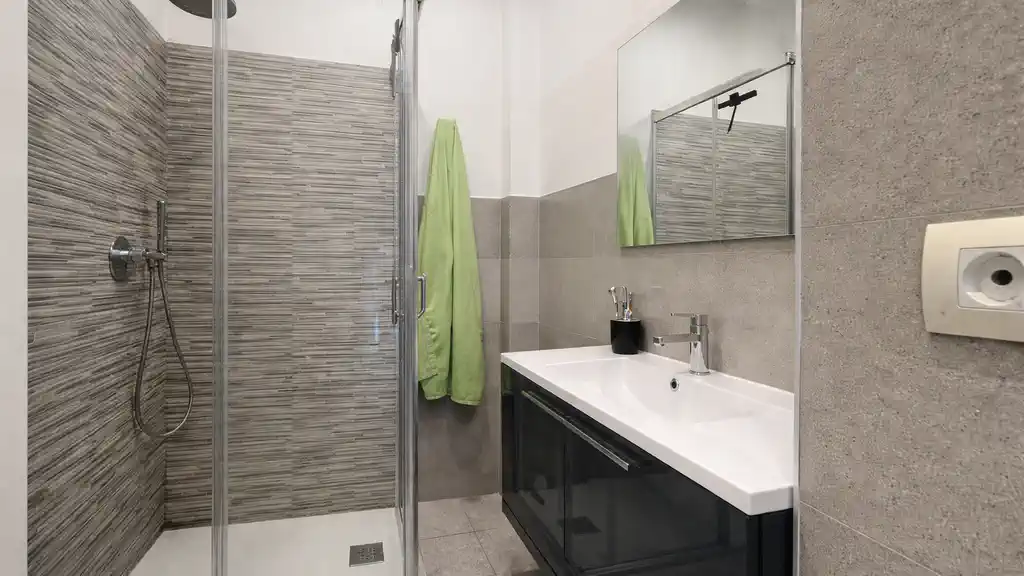 ванная комната в квартире под аренду в Borgo San Paolo Турин