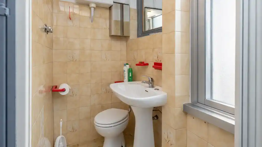 ванная комната в квартире в районе San Donato в Турине